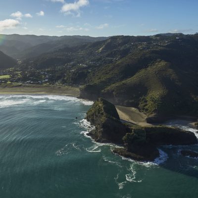 128022-piha-beach-with-waitakere-ranges-in-the-distance