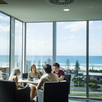 Students Charlotte Michau, Stefanie Strauss and Jackson North enjoying views from Gold Coast campus. Photo taken during filmshoot