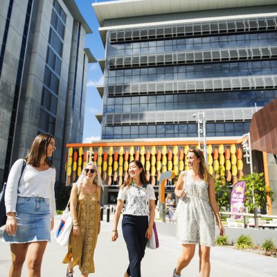 Students Georgia Muller, Charlotte Michau, Honoka Tokikto and Stefanie Strauss enjoying the Gold Coast campus. Photo taken during filmshoot